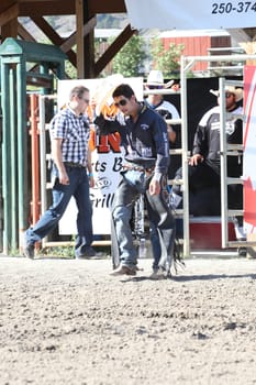 MERRITT, B.C. CANADA - May 30, 2015: Bull rider in the opening ceremony at The 3nd Annual Ty Pozzobon Invitational PBR Event.