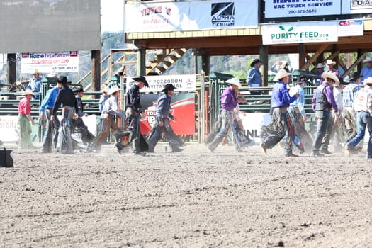 MERRITT, B.C. CANADA - May 30, 2015: Bull riders at opening ceremony of The 3nd Annual Ty Pozzobon Invitational PBR Event.