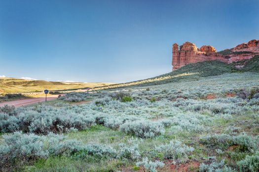 prairie, shrubland and sandstone rock formation in northern Colorado near Wyoming border -Ssnd Creek National Landmark