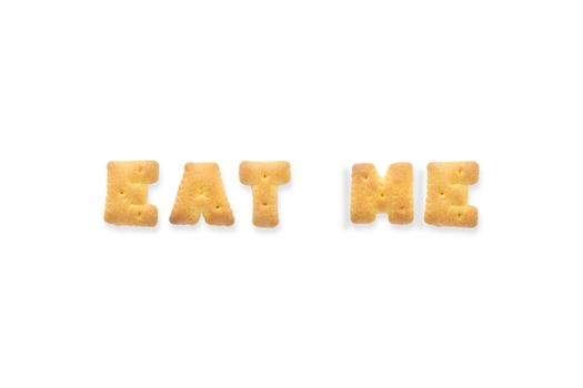 Collage of the character word EAT ME. Alphabet biscuit cracker isolated on white background