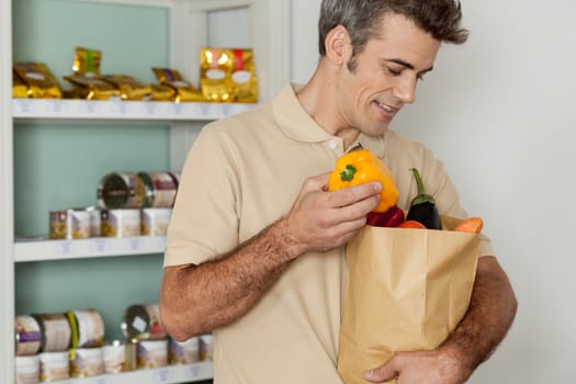 man shopping a vegetables