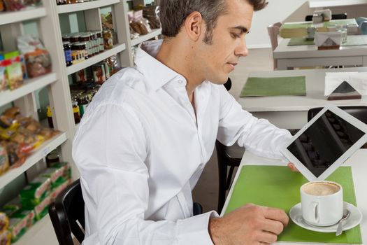 man drinking a coffee