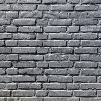 square part of grey painted brick wall
