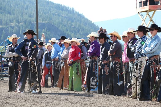 MERRITT, B.C. CANADA - May 30, 2015: Bull rider riding in the first round of The 3rd Annual Ty Pozzobon Invitational PBR Event.
