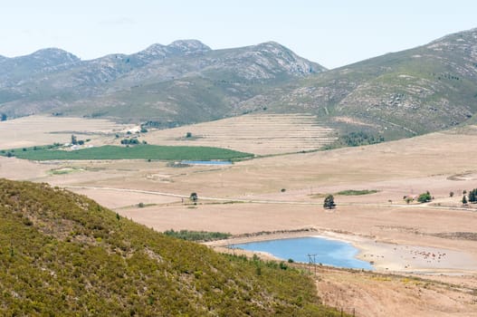 UNIONDALE, SOUTH AFRICA - JANUARY 6, 2015: View from the Potjiesberg pass near Uniondale. Dams and a vineyard are visible