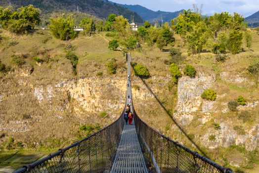 Suspension bridge over the Bhalam river in Pokhara, Nepal
