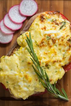 French toast ham cheese and salad on wooden table 