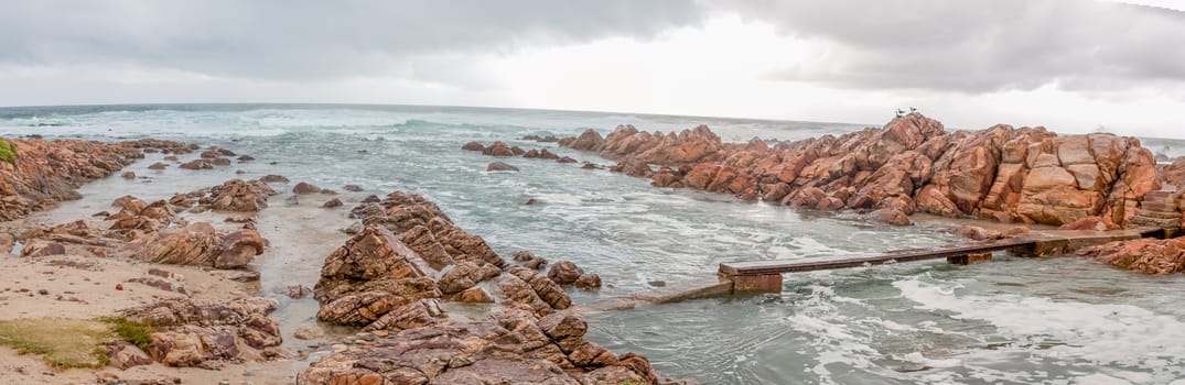 The Point tidal swimming pool in Mosselbay, South Africa on a stormy day