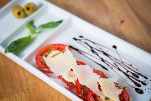 Fresh tomatoes, basil, garlic and parmesan cheese. Shallow dof