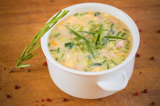 Close-up of russian cold vegetable soup on yogurt, sour-milk base -  okroshka