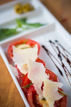 Fresh tomatoes, basil, garlic and parmesan cheese. Shallow dof