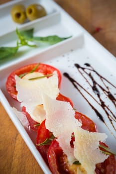 Fresh tomatoes, basil, garlic and parmesan cheese. Shallow dof