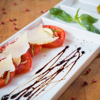 Fresh tomatoes, basil, garlic and parmesan cheese. Shallow dof