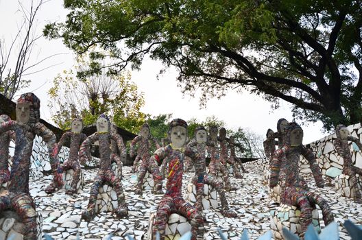 Chandigarh, India - January 4, 2015: Rock statues at the rock garden on January 4, 2015 in Chandigarh, India. The rock garden was founded by artist Nek Chand in 1957 and is made completely of recycled waste.