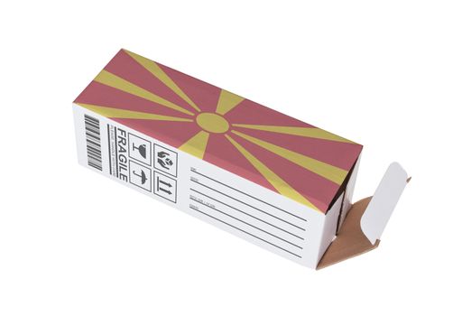Concept of export, opened paper box - Product of Macedonia