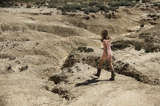 girl walking in the desert