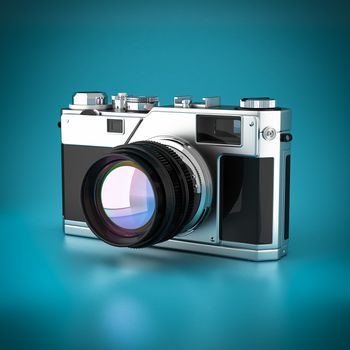 Vintage digital camera on a blue background