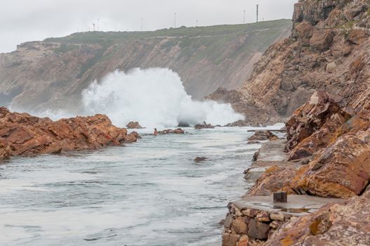 MOSSELBAY, SOUTH AFRICA - DECEMBER 27, 2014: The Point tidal swimming pool in Mosselbay, South Africa on a stormy day