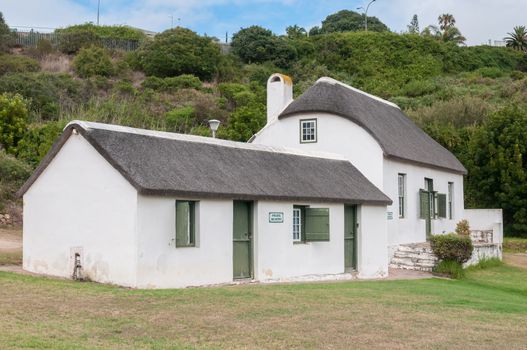 MOSSELBAY, SOUTH AFRICA - DECEMBER 30, 2014: Historic Munrohoek cottages on the premises of the Dias Museum