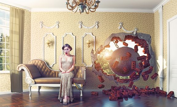 wrecking ball enters the room, scaring the woman on the sofa. Photo combination creative concept