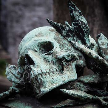 More than 100 years old statue. Cemetery located in North Italy.