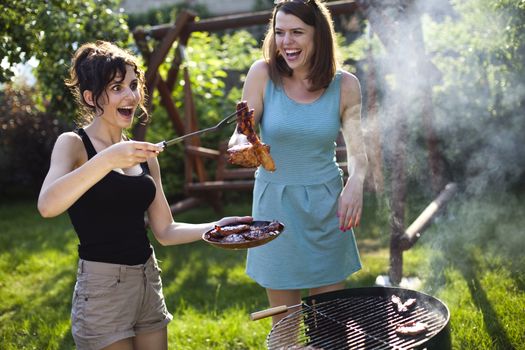 Two girls on grill, natural colorful tone