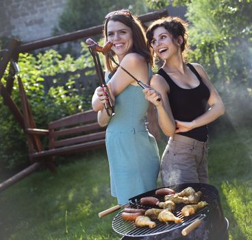 Two girls on grill, natural colorful tone