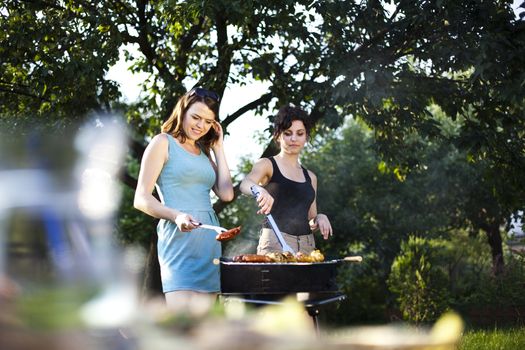 Two girls on grill, natural colorful tone