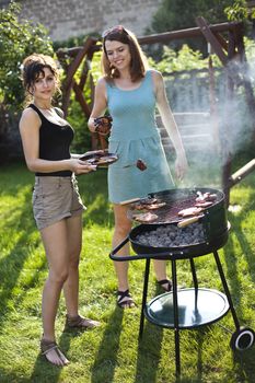 Two girls on grill, natural colorful tone