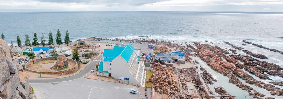 MOSSELBAY, SOUTH AFRICA - DECEMBER 30, 2014: View from the cave at Cape St. Blaize towards the hotel and swimming pool at The Point and the War Memorial