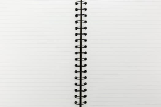 white notebook with line on cork board