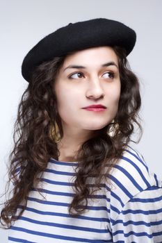 Young Woman with French Style Beret Hat and Striped T-shirt