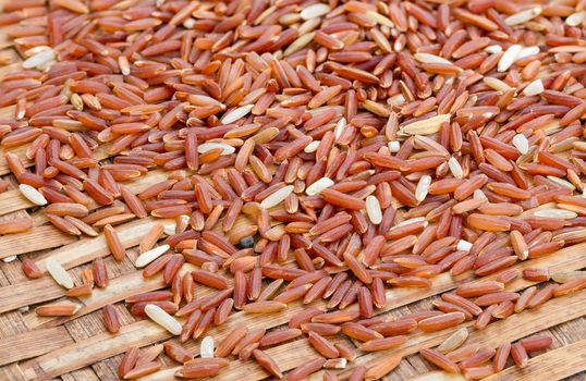 Organic Brown Rice (unpolished rice) on bamboo plate