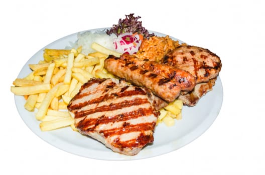 Greek Grill plate. Grilled meat with chips.