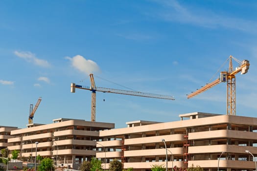 Skeleton of buildings under construction with the crane
