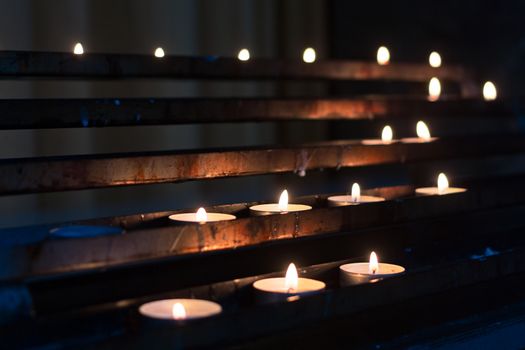 candles in row in the church