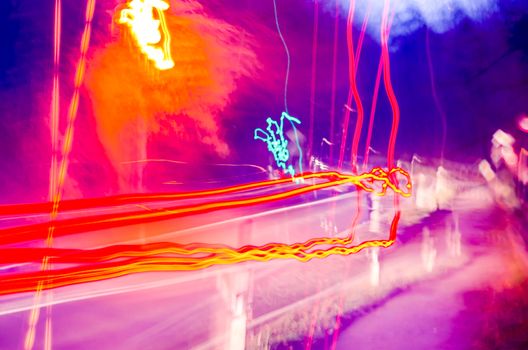 Long exposure of a vehicle traveling at night.