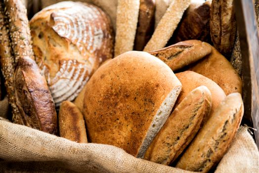 Various kinds of fresh baked bread loaves