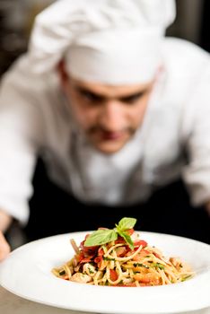 Close up image of pasta salad, focus on pasta.
