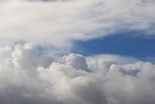 Above the storm cloud.