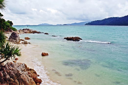 Clean and clear beach, rock and sea water in Lipe island, Thailand