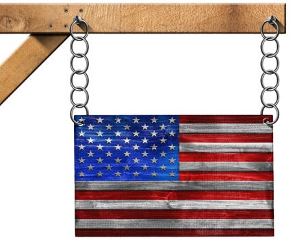 Wooden USA flag hanging from a metal chain on a wooden pole and isolated on white background