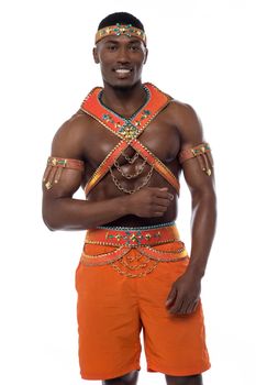 Smiling male samba dancer posing over white