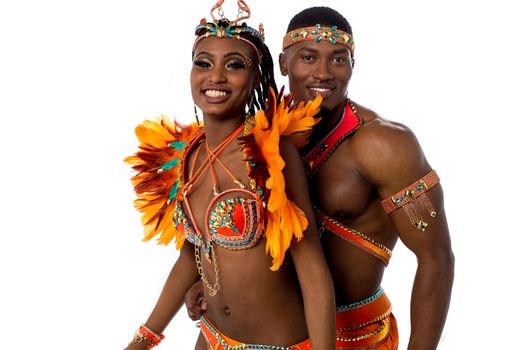 Happy samba dancers posing together