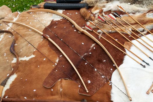Medieval Middle Age weapons traditional bows and arrows in a display                              