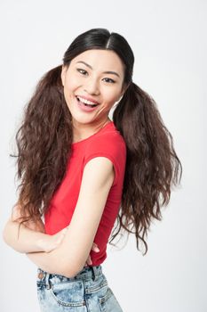 Sideways of chinese woman posing over white