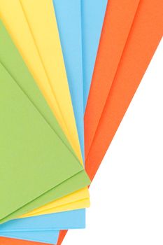 Close up detailed top view of heap of multicolored envelopes on end, isolated on white background.