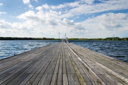 Wooden pier in Weer Water, Almere, Netherlands