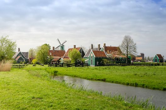 Windmill and rural houses in Zaanse Schans, The Netherlands.