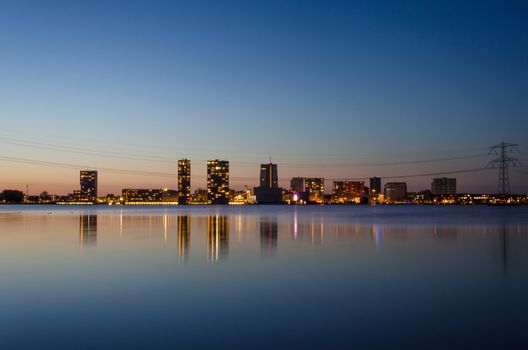 skyline of the modern city center of Almere, Flevoland, The Netherlands. Twilight time.